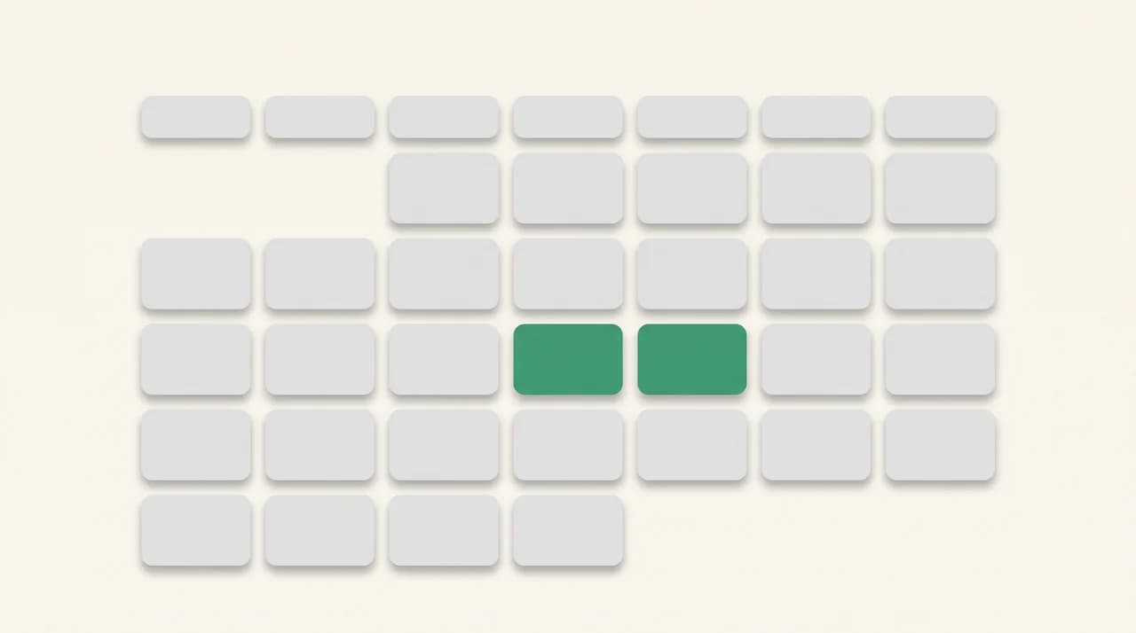 A grid of identical grey tiles with two adjacent tiles filled green, representing the two files copied out of a large shared folder